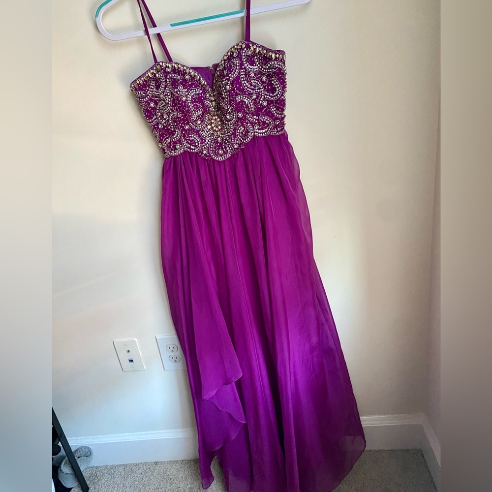 Beautiful prom dress worn once.